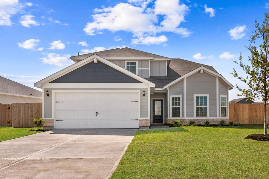 Front exterior of a new home in Trails at Cochran Ranch, Waller, TX, highlighting curb appeal (Image 1).