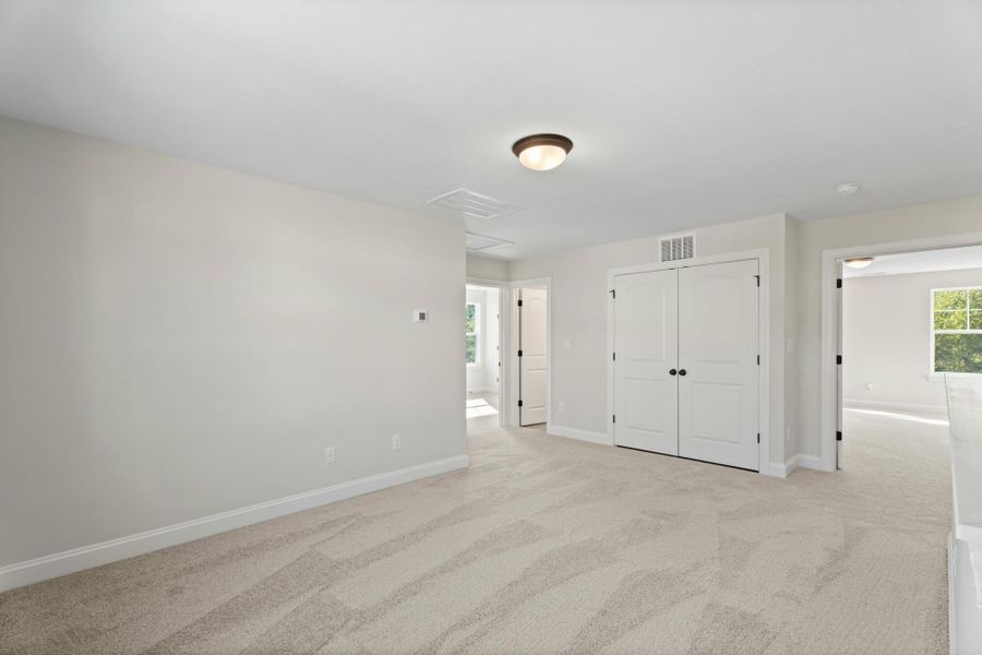 Spacious, unfurnished interior of a new home in Cottages at Piper Village, Trinity (Image 15).