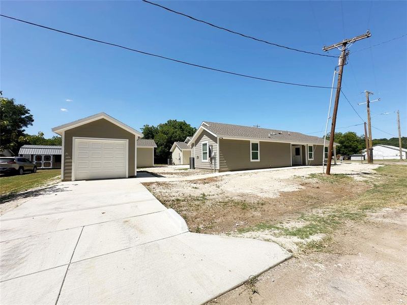 Front exterior of a new home in , Mineral Wells, TX, highlighting curb appeal (Image 14). Front exterior of a new home in , Mineral Wells, TX, highlighting curb appeal (Image 14).