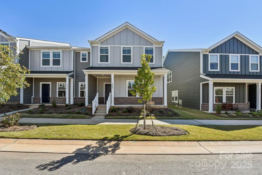 Front exterior of a new home in , Mooresville, NC, highlighting curb appeal (Image 1). Front exterior of a new home in , Mooresville, NC, highlighting curb appeal (Image 1).