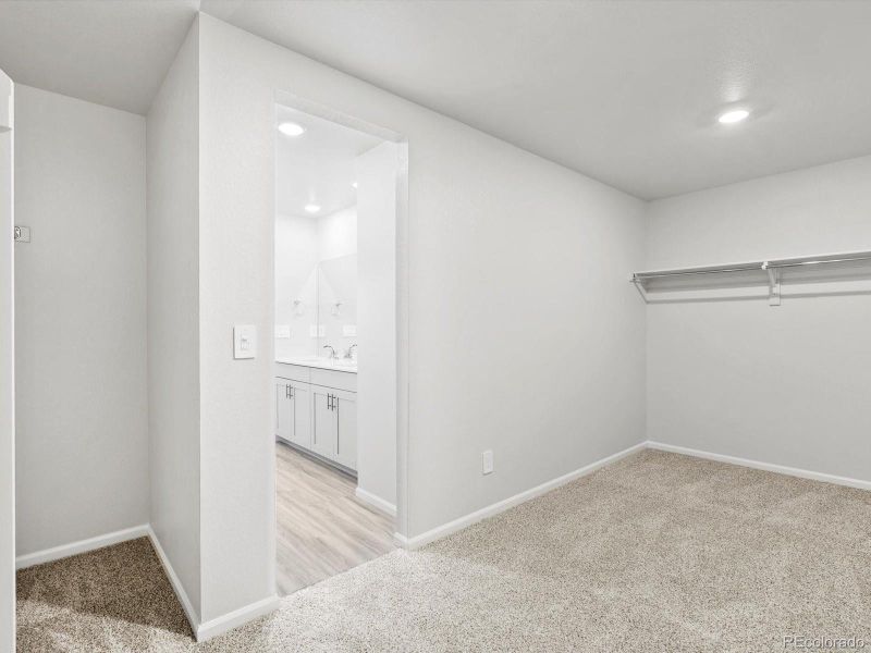 Spacious, unfurnished interior of a new home in Ridgeline Vista: The Canyon Collection, Brighton (Image 23).