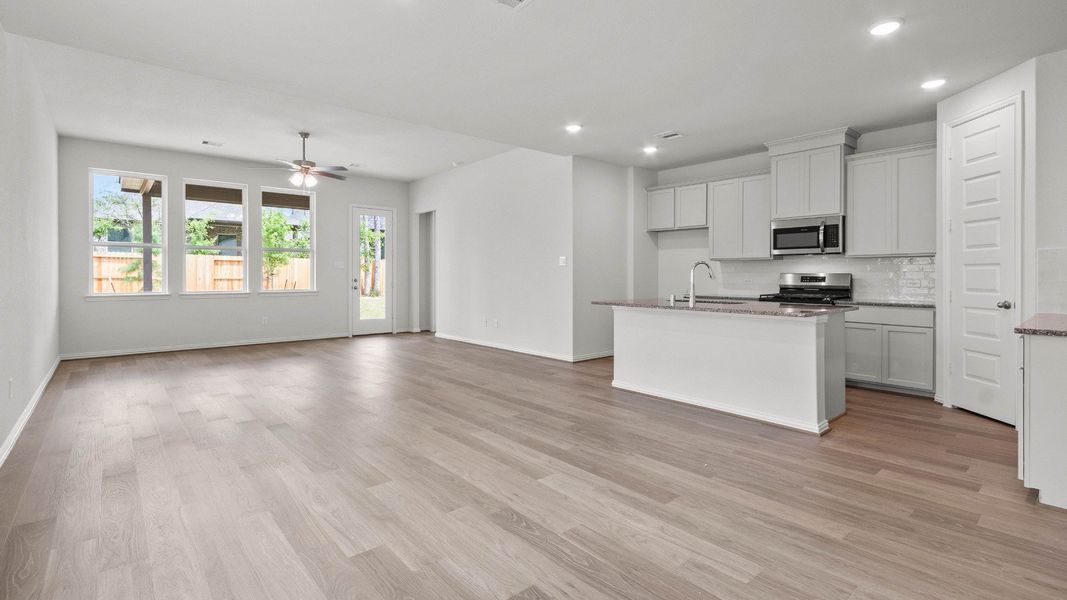 Representative furnished interior of a home built from the Capri II by Brightland Homes in Bridgeland Creekland Village, Cypress (Image 7).