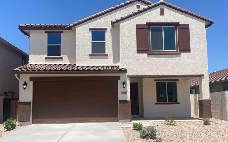 Front exterior of a new home in Wildera, San Tan Valley, AZ, highlighting curb appeal (Image 13). Front exterior of a new home in Wildera, San Tan Valley, AZ, highlighting curb appeal (Image 13).