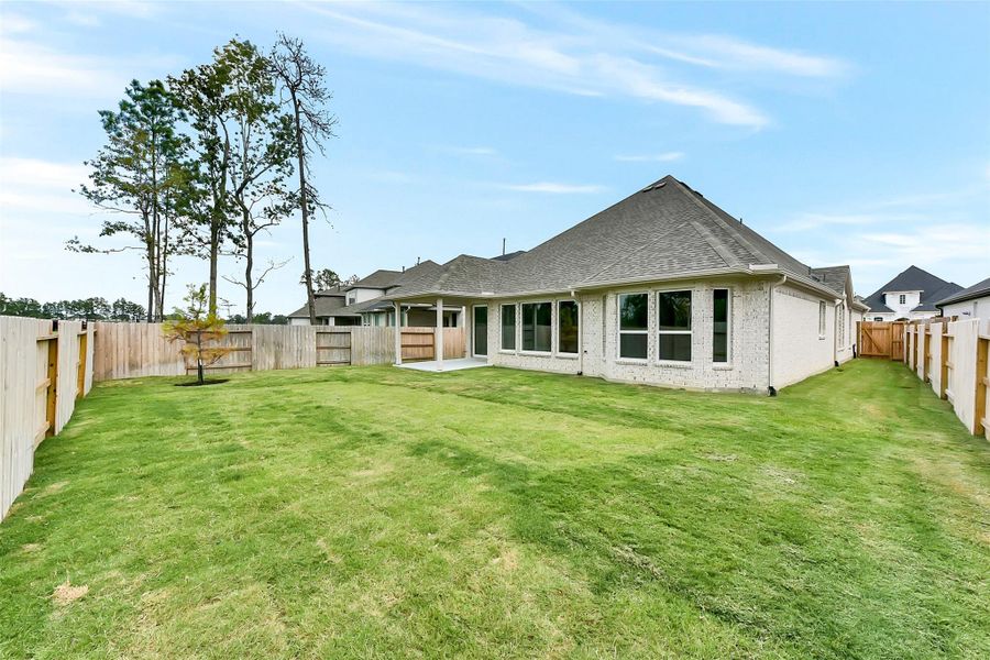 Front exterior of a new home in Evergreen 50', Conroe, TX, highlighting curb appeal (Image 20). Front exterior of a new home in Evergreen 50', Conroe, TX, highlighting curb appeal (Image 20).