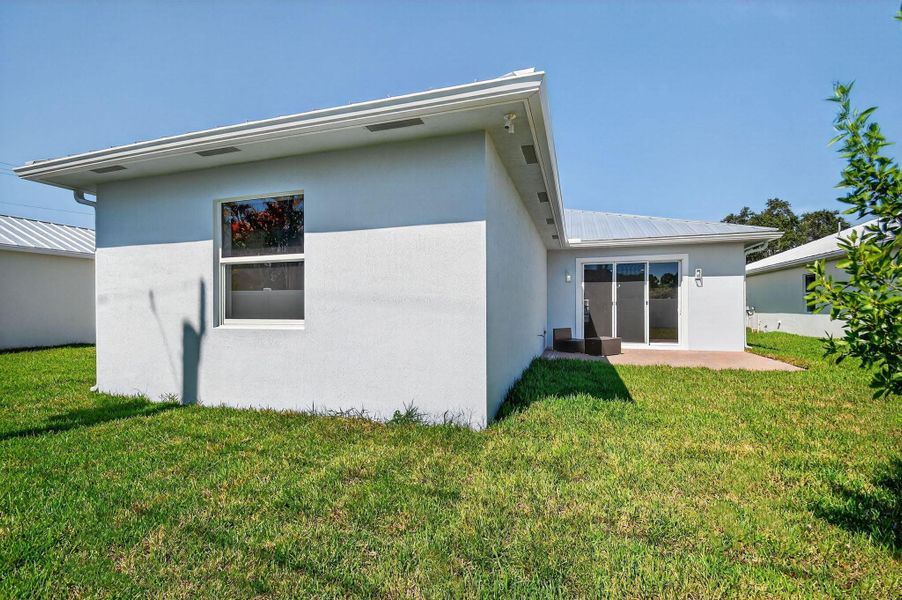 Exterior details and patio area of a home in , Jupiter (Image 29).