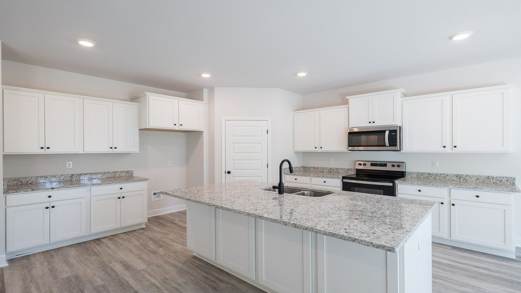 Furnished interior view inside a new home in Pine Dove Estates, Tallahassee (Image 4).
