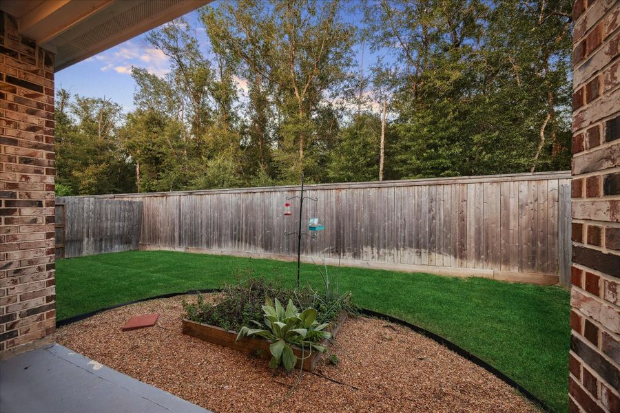 Exterior details and patio area of a home in , Conroe (Image 2).