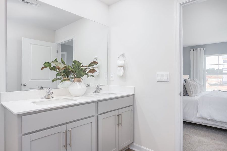 Representative furnished interior of a home built from the Cali by D.R. Horton in Havencrest, Greensboro (Image 25).