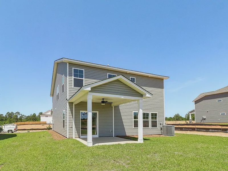 Front exterior of a new home in Providence Station at Trolley Run, Aiken, SC, highlighting curb appeal (Image 15). Front exterior of a new home in Providence Station at Trolley Run, Aiken, SC, highlighting curb appeal (Image 15).