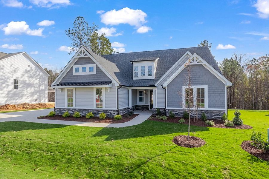 Representative exterior photo of a completed home built from the The Bradley by RobuckHomes in Baylee Ridge, Selma, NC (Image 35). Representative exterior photo of a completed home built from the The Bradley by RobuckHomes in Baylee Ridge, Selma, NC (Image 35).