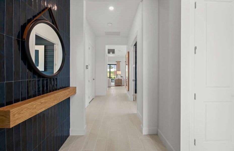 Representative furnished interior of a home built from the Prosperity by DiVosta in BeachWalk by Manasota Key, Englewood (Image 8).