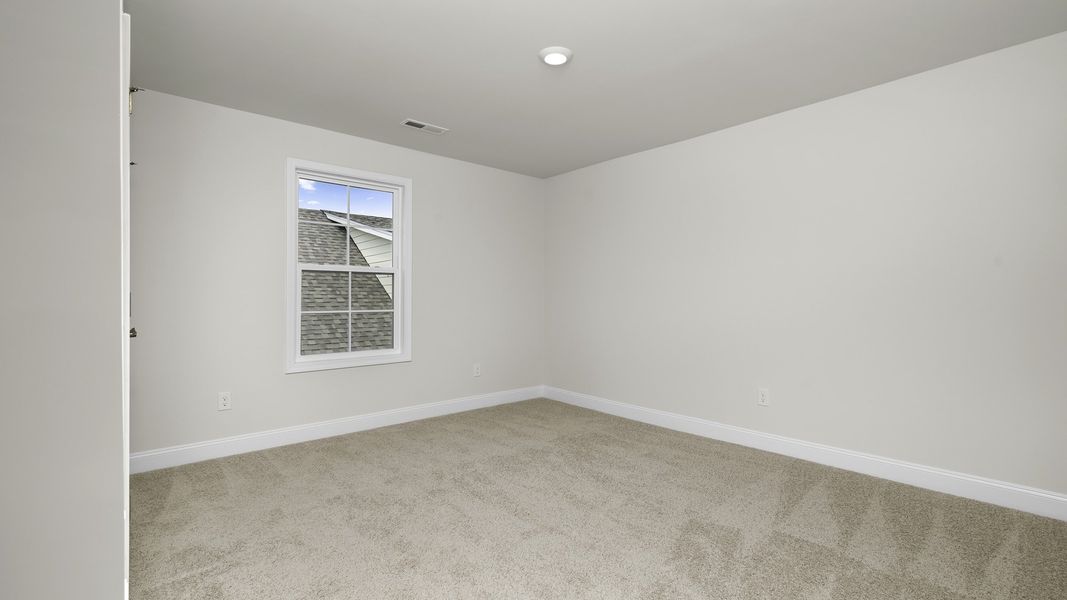 Spacious, unfurnished interior of a new home in The Villas at Kinsley, Jamestown (Image 19).