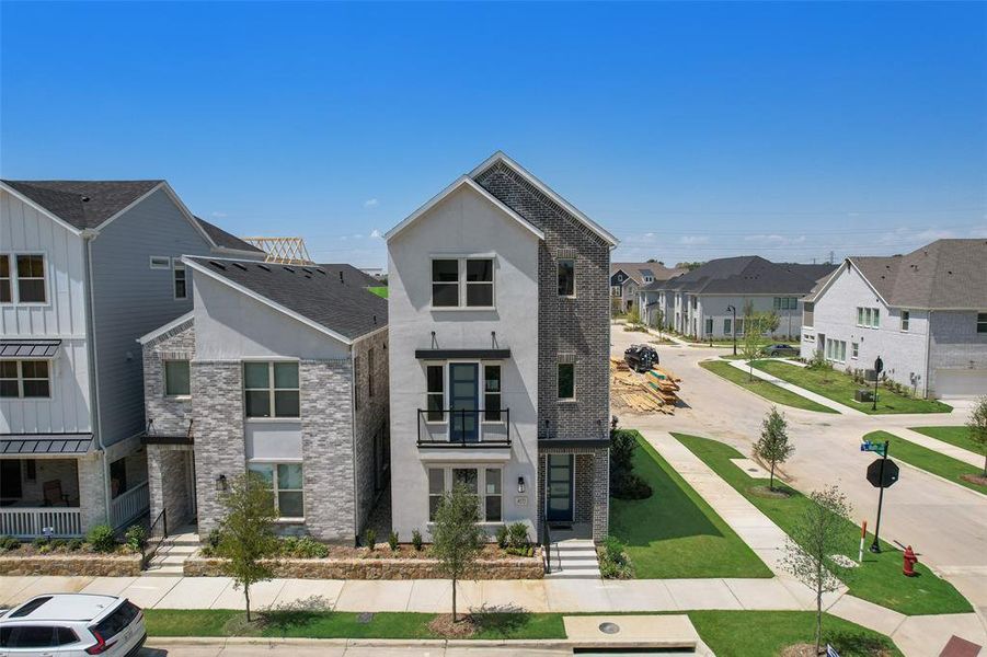 Front exterior of a new home in City Point, North Richland Hills, TX, highlighting curb appeal (Image 1).