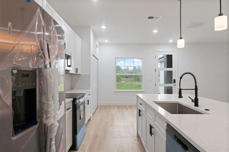 Furnished interior view inside a new home in , Ocala (Image 3).