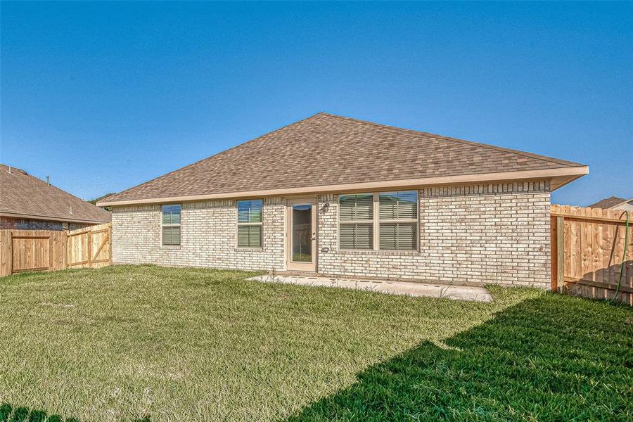 Front exterior of a new home in Bayou Maison, Dickinson, TX, highlighting curb appeal (Image 16). Front exterior of a new home in Bayou Maison, Dickinson, TX, highlighting curb appeal (Image 16).