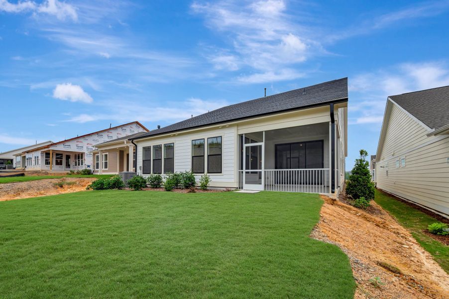 Exterior details and patio area of a home in Altis At Serenity | A 55+ Community, Fuquay Varina (Image 4). Exterior details and patio area of a home in Altis At Serenity | A 55+ Community, Fuquay Varina (Image 4).