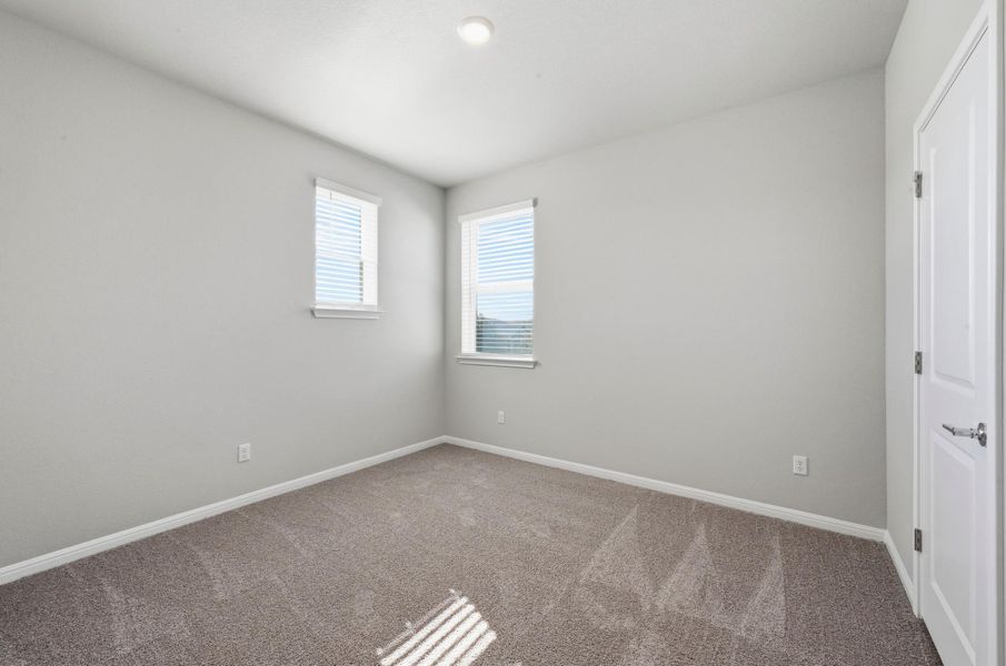 Neutral gray walls complementing light gray carpet Neutral gray walls complementing light gray carpet