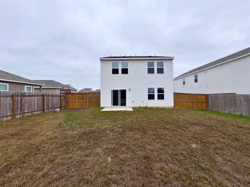 Rear view of property featuring a patio and a fenced backyard Rear view of property featuring a patio and a fenced backyard
