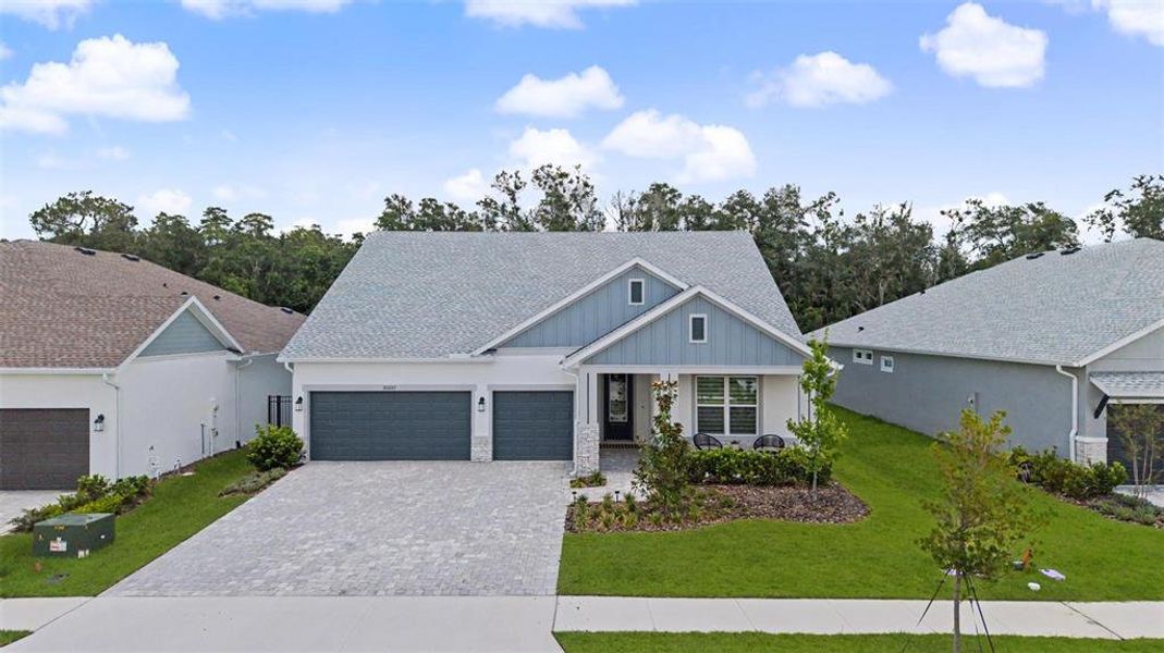 Front exterior of a new home in , Wesley Chapel, FL, highlighting curb appeal (Image 21). Front exterior of a new home in , Wesley Chapel, FL, highlighting curb appeal (Image 21).