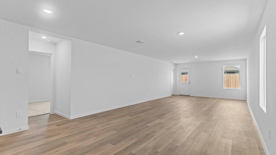 Representative unfurnished interior of a home built from the ESTERO by D.R. Horton in Canterra Creek 45' and 50' Homesites, Iowa Colony (Image 11).