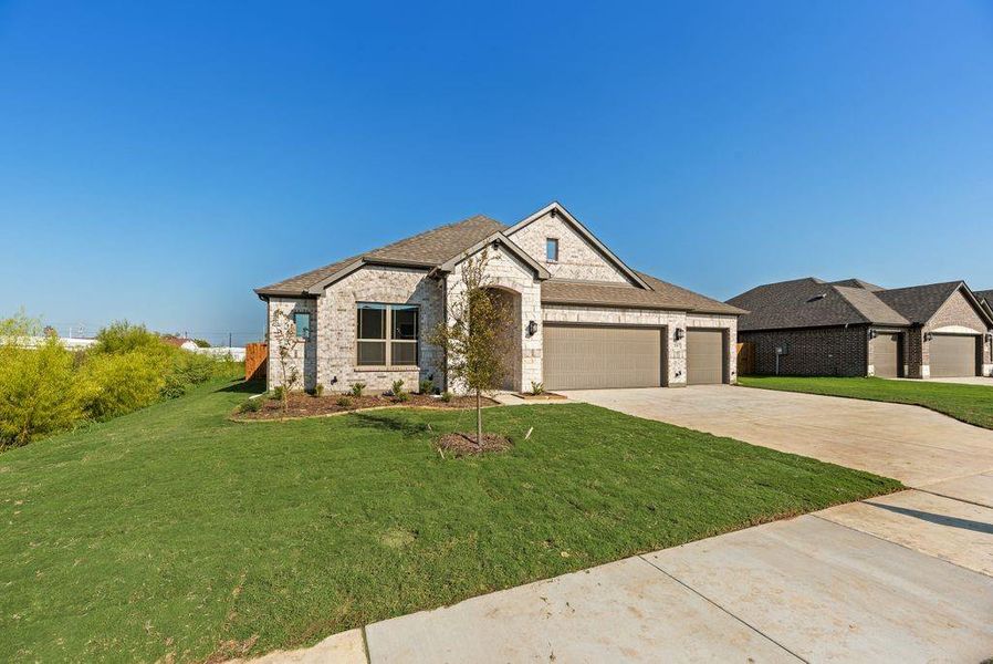Front exterior of a new home in , Pilot Point, TX, highlighting curb appeal (Image 2).