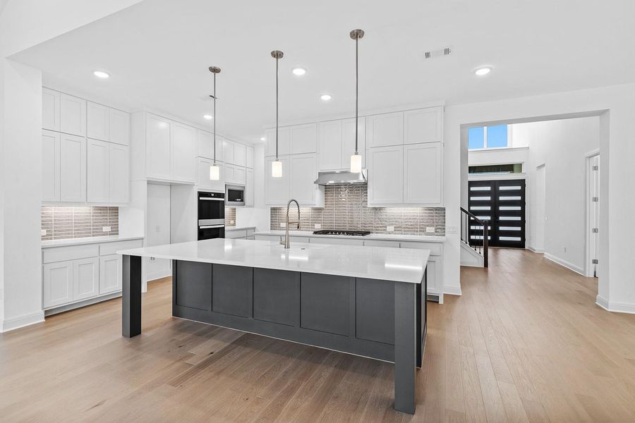 Furnished interior view inside a new home in The Hollows Canyon - 60', Lago Vista (Image 6). Furnished interior view inside a new home in The Hollows Canyon - 60', Lago Vista (Image 6).