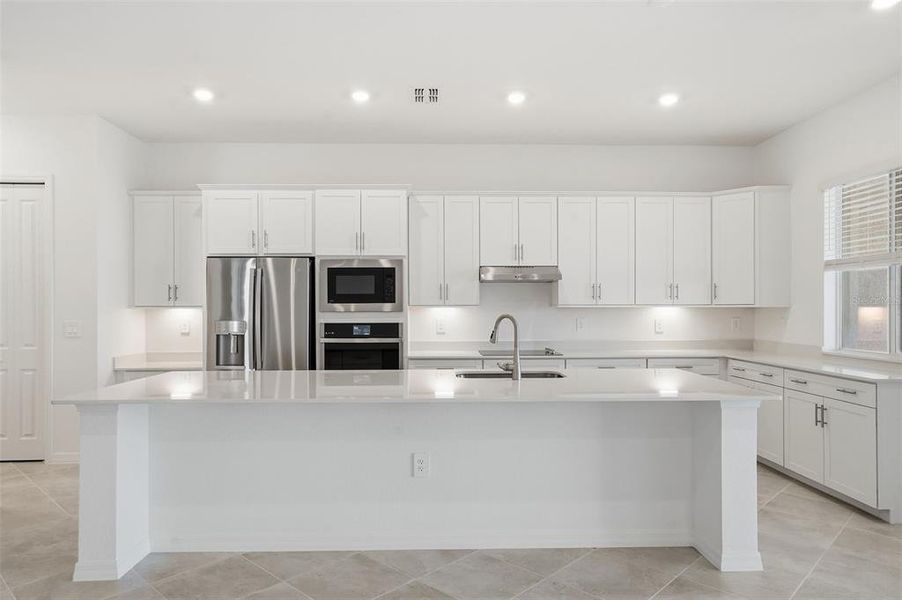 Furnished interior view inside a new home in Wellen Park Golf & Country Club, Venice (Image 8).