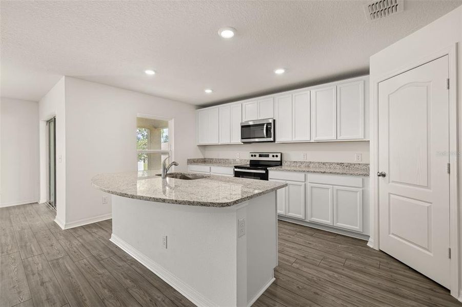 Furnished interior view inside a new home in , Poinciana (Image 5). Furnished interior view inside a new home in , Poinciana (Image 5).