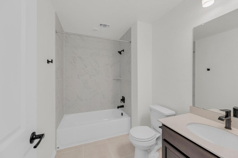 Furnished interior view inside a new home in Salerno - Classic Collection, Round Rock (Image 18). Furnished interior view inside a new home in Salerno - Classic Collection, Round Rock (Image 18).