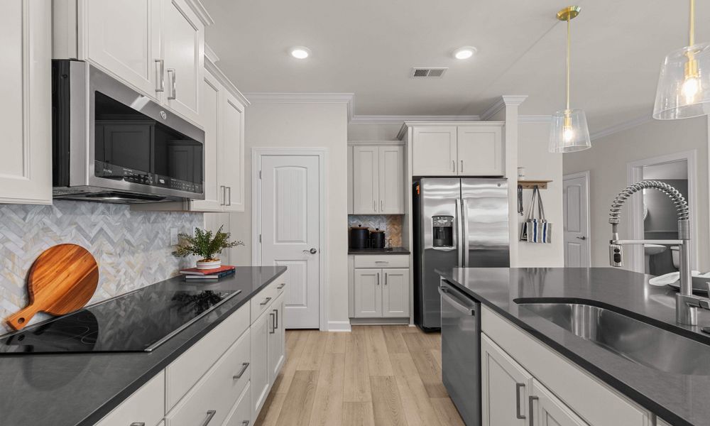 Representative furnished interior of a home built from the The Hibiscus by Chesapeake Homes in Traditions at Carolina Forest, Myrtle Beach (Image 11).