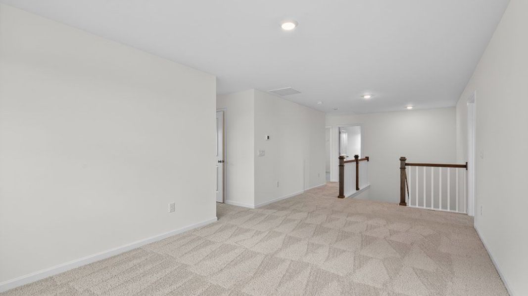 Representative unfurnished interior of a home built from the Wylie by D.R. Horton in Kalas Falls, Wake Forest (Image 25).