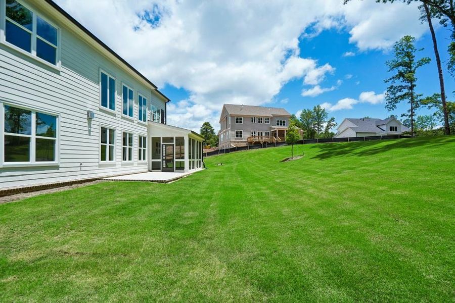 Exterior details and patio area of a home in Arden on Lanier, Cumming (Image 4).