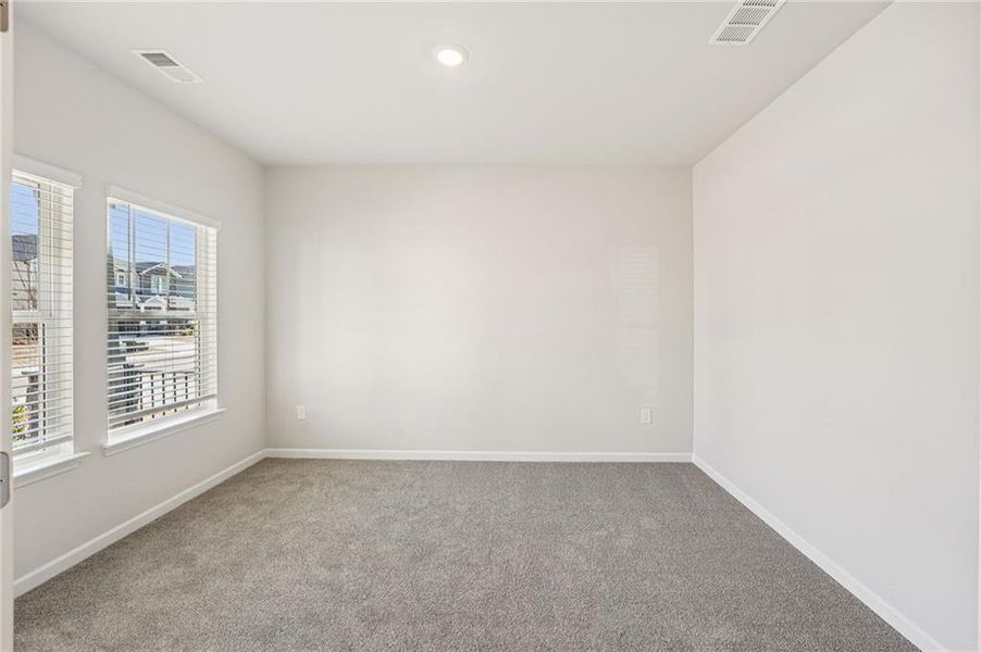 Spacious, unfurnished interior of a new home in Westmont Preserve, Powder Springs (Image 38).