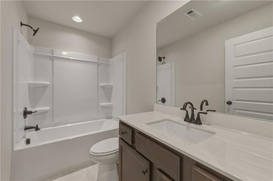 Furnished interior view inside a new home in The Towns at Auburn Station East, Auburn (Image 8).