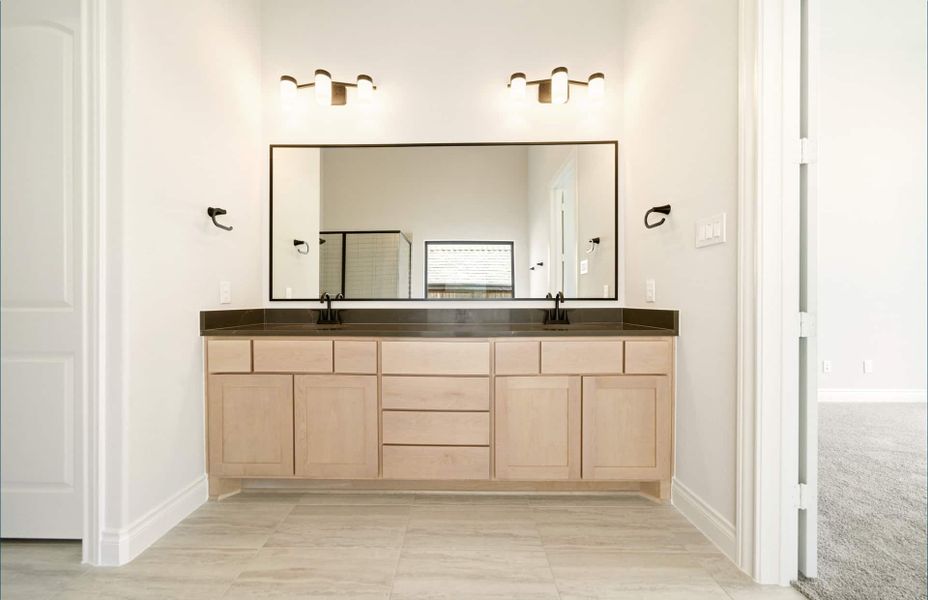 Furnished interior view inside a new home in Bridgeland 60′, Cypress (Image 19).