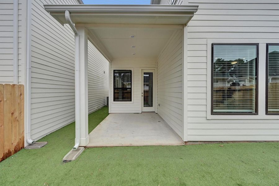 Exterior details and patio area of a home in Summer Place 35', Montgomery (Image 25). Exterior details and patio area of a home in Summer Place 35', Montgomery (Image 25).