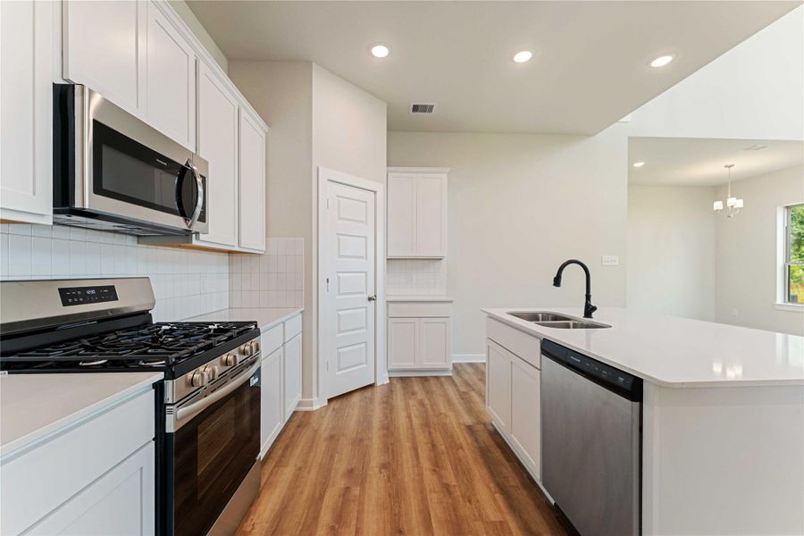 Furnished interior view inside a new home in Lexington Heights, Willis (Image 4).