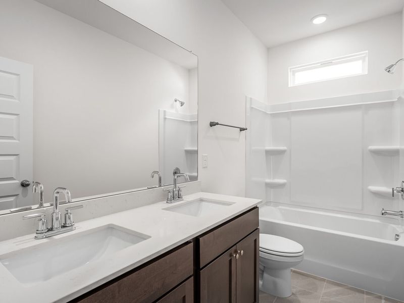 Representative furnished interior of a home built from the The Cottonwood E by Davidson Homes LLC in Woods Crossing, Gallatin (Image 14).