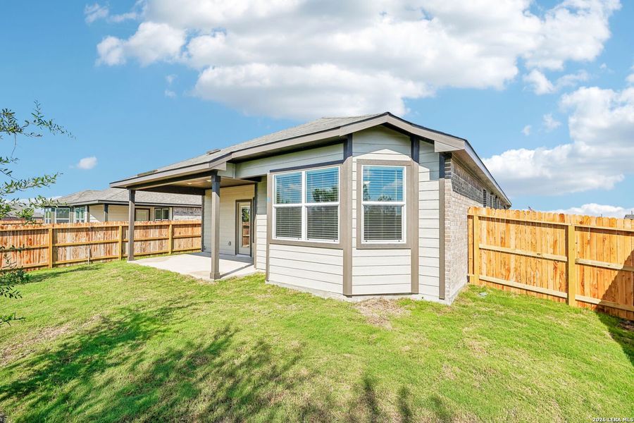Exterior details and patio area of a home in Carmel Ranch, Schertz (Image 3).