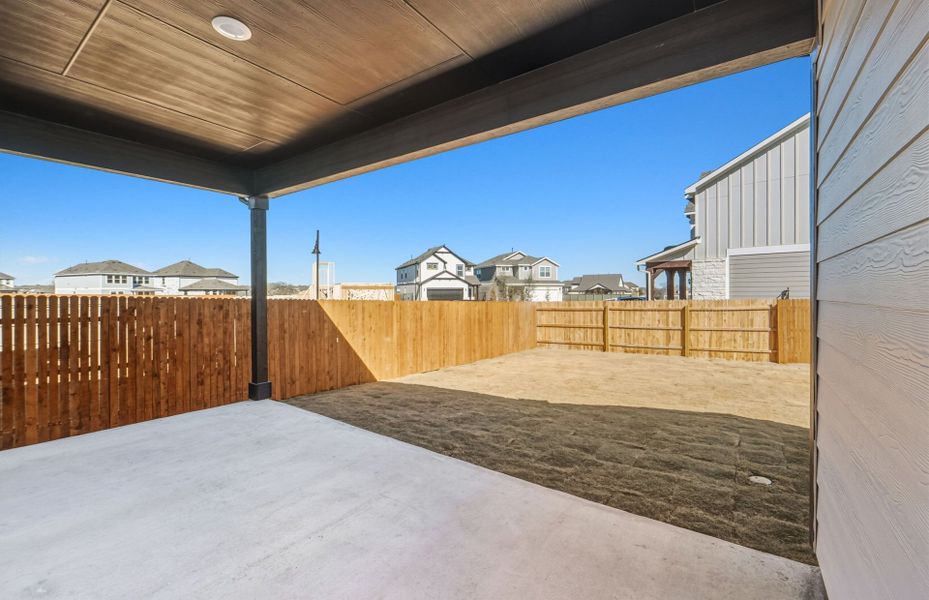 Exterior details and patio area of a home in Santa Rita Ranch, Liberty Hill (Image 23). Exterior details and patio area of a home in Santa Rita Ranch, Liberty Hill (Image 23).