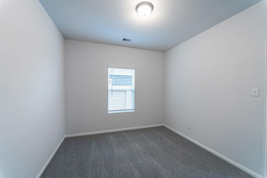 Spacious, unfurnished interior of a new home in Sweetgrass Village, Crosby (Image 7).