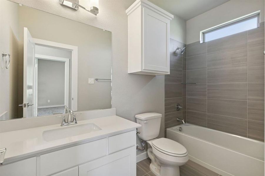 Bathroom in the Henley home plan by Trophy Signature Homes – REPRESENTATIVE PHOTO Bathroom in the Henley home plan by Trophy Signature Homes – REPRESENTATIVE PHOTO
