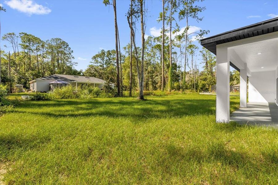 Exterior details and patio area of a home in , Citrus Springs (Image 21).