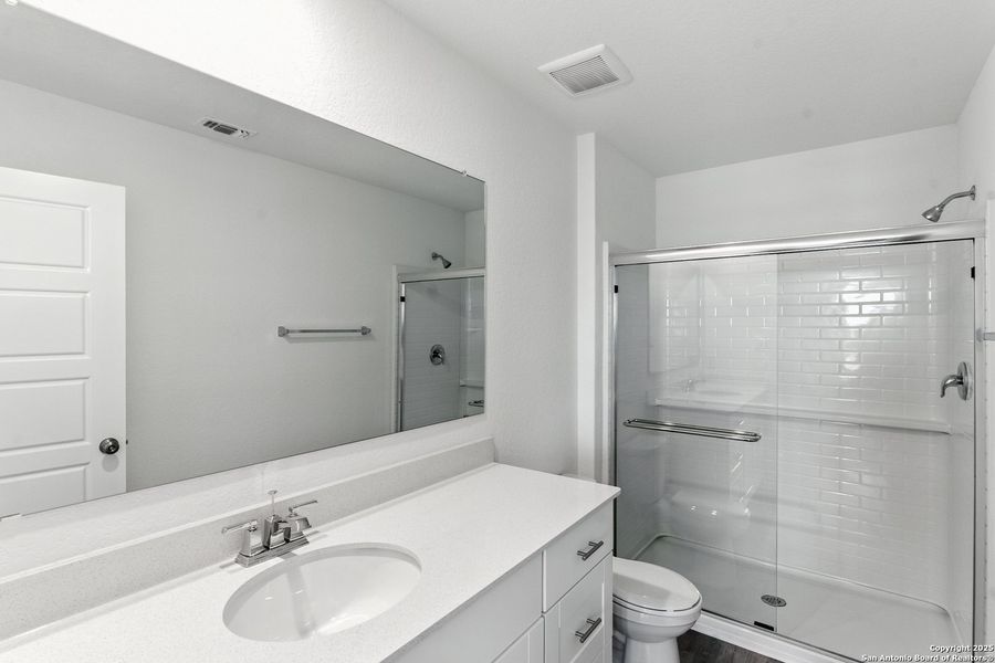 Furnished interior view inside a new home in Vista Real, Converse (Image 9).