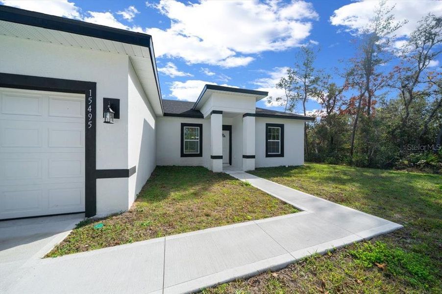 Exterior details and patio area of a home in , Ocala (Image 40).