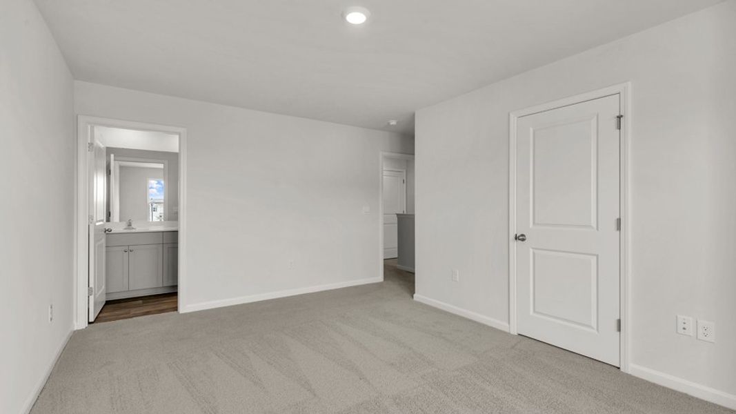 Spacious, unfurnished interior of a new home in The Townes at Wilson's Ridge, Smithfield (Image 21).