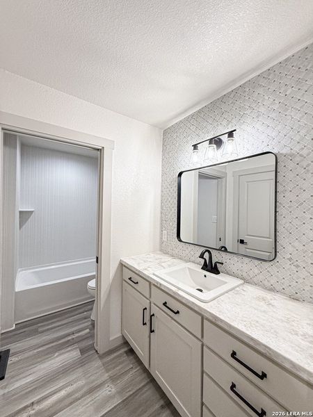 Furnished interior view inside a new home in , Devine (Image 9).