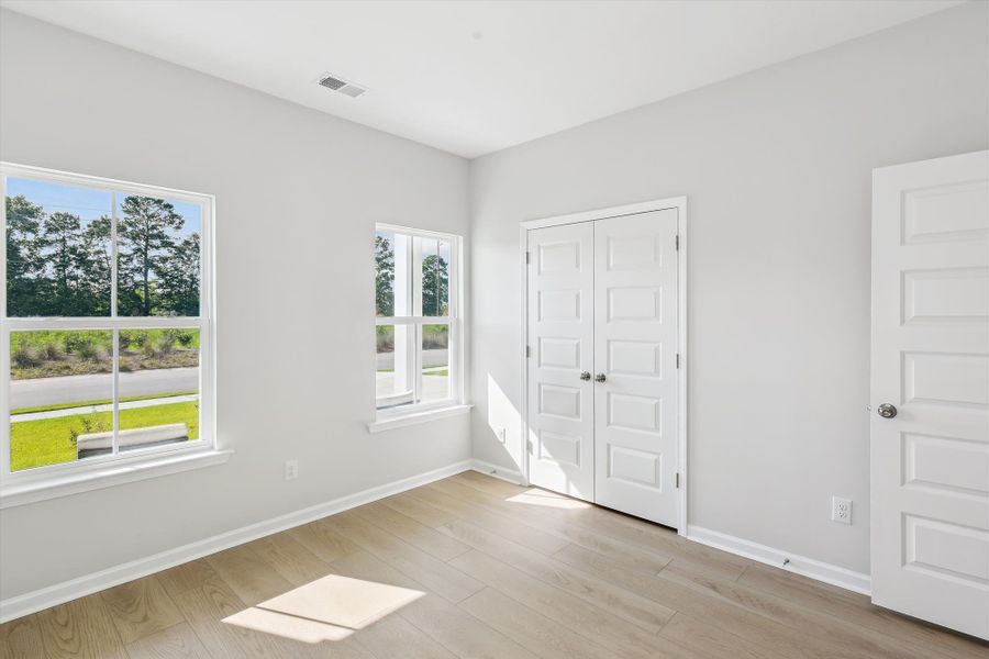 Spacious, unfurnished interior of a new home in Saint John's Lake: Arbor Collection, Johns Island (Image 21).