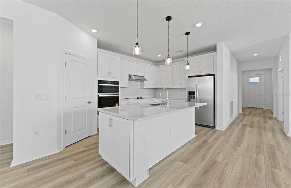 Furnished interior view inside a new home in Riversong, Parrish (Image 6).
