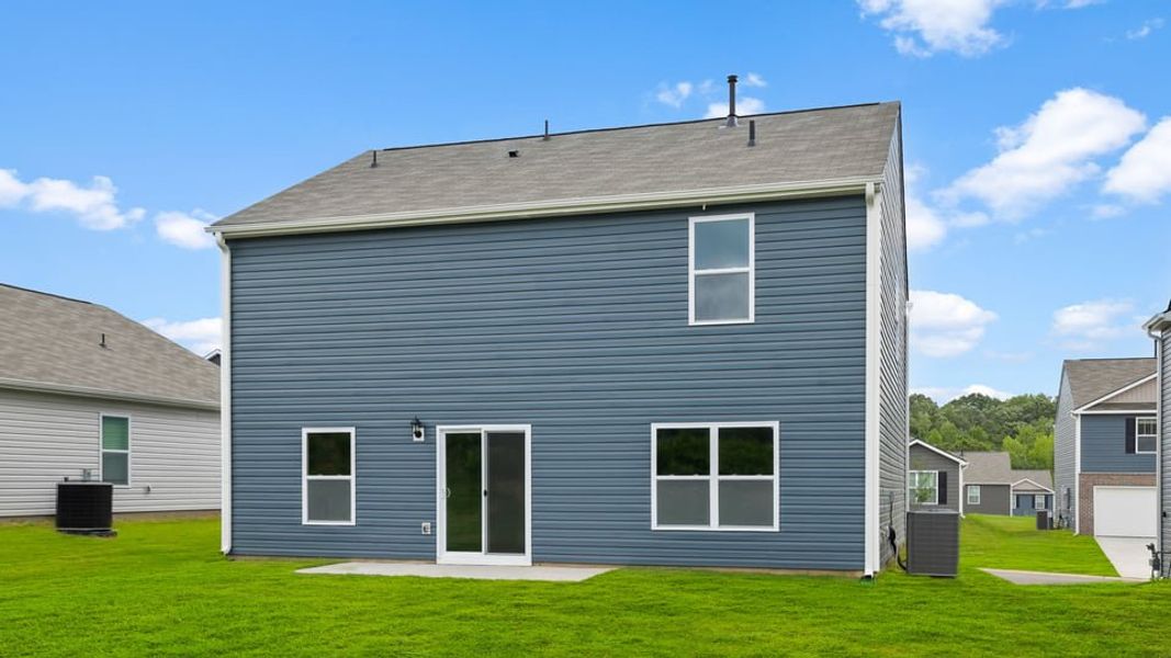 Exterior details and patio area of a home in Treemont Commons, Wellford (Image 4).